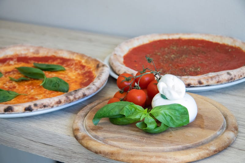 Hawaiian pizza with ham and pineapple on honey-glazed crust