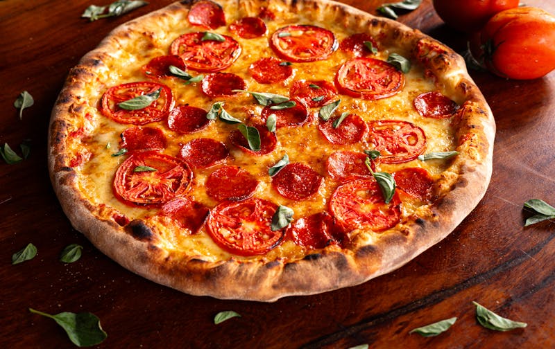 Seafood pizza with shrimp and calamari on olive oil base