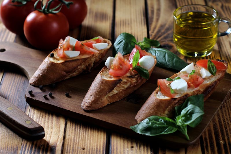 Bruschetta with heirloom tomatoes and fresh basil on toasted bread