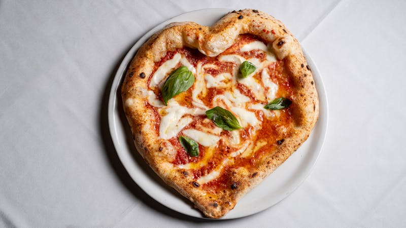 The Purple Reign signature pizza with truffle oil and wild mushrooms